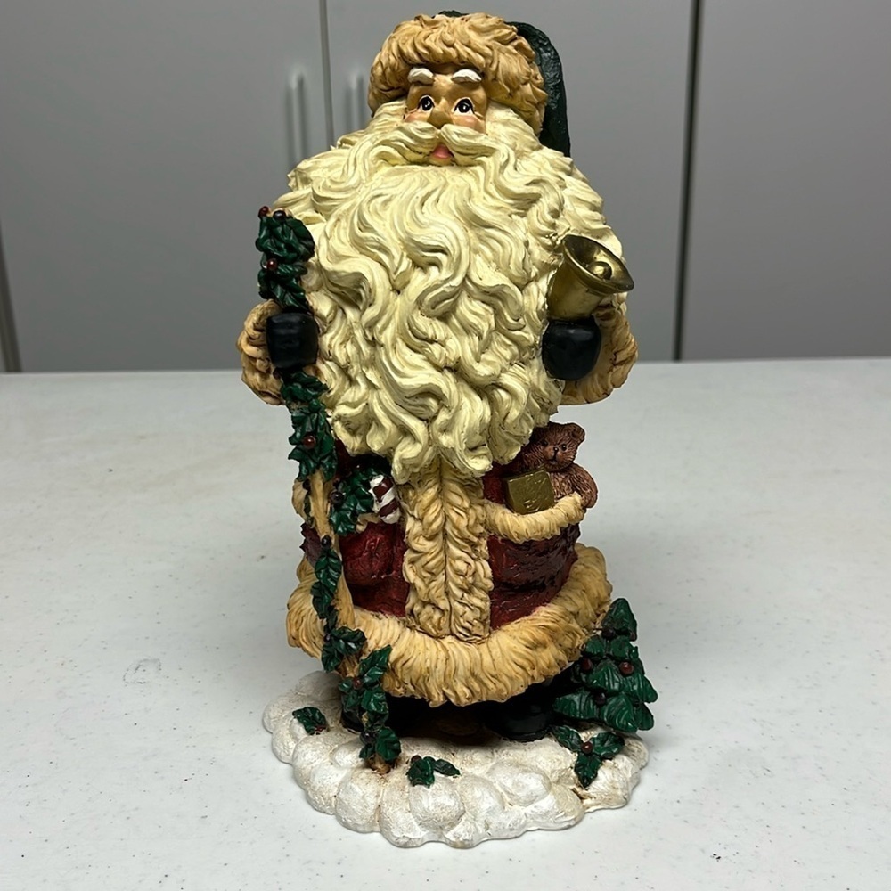 Santa  holding bell, bag of toys figure
